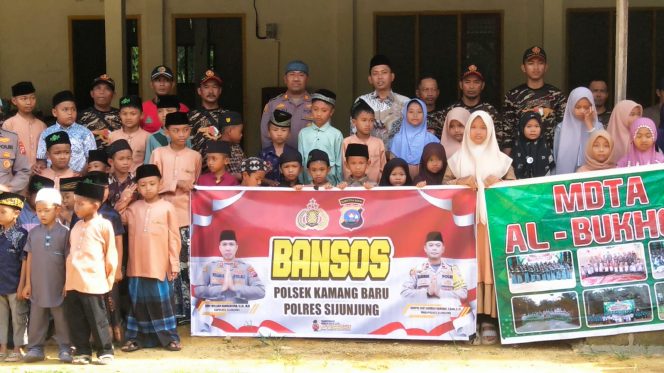 
					Dalam Rangka Harlah Ke 92, Sinergi Polisi dan Banser, Salurkan Bantuan Kapolres Sijunjung Mengalir untuk Ponpes Al Bukhori